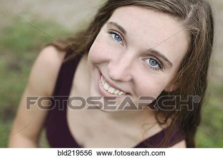 Stock Photograph - Close up of smiling woman. Fotosearch