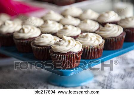 Picture - Close up of tray of cupcakes. Fotosearch