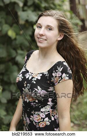Close up of woman smiling outdoors View Large Photo Image Stock Image - Close up of woman smiling outdoors. Fotosearch