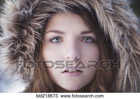 Close up of woman wearing fur hood View Large Photo Image Stock Image - Close up of woman wearing fur hood. Fotosearch