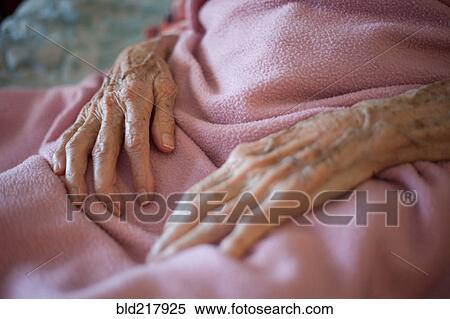 Close up of wrinkled hands of senior woman View Large Photo Image Stock Photography - Close up of wrinkled hands of senior woman. Fotosearch