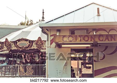 Cotton candy stall at amusement park View Large Photo Image Stock Image - Cotton candy stall at amusement park. Fotosearch