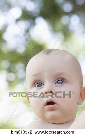 Stock Image - Curious Caucasian baby. Fotosearch