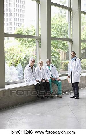 Doctors in lobby View Large Photo Image Stock Photograph - Doctors in lobby. Fotosearch
