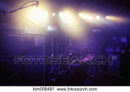 Drum kit on spotlighted stage View Large Photo Image Stock Photo - Drum kit on spotlighted stage. Fotosearch