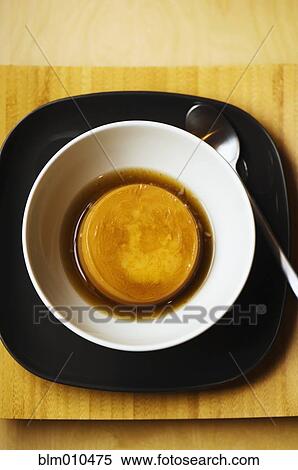 Flan dessert in bowl View Large Photo Image Stock Photography - Flan dessert in bowl. Fotosearch