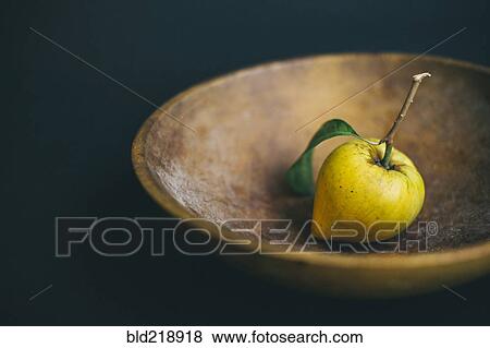 Fresh lemon and stem in wooden bowl View Large Photo Image Stock Photo - Fresh lemon and stem in wooden bowl. Fotosearch