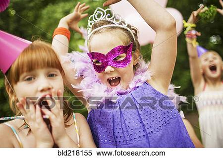 Girls playing dress-up at birthday party View Large Photo Image Stock Photography - Girls playing dress-up at birthday party. Fotosearch