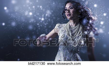 Glamorous Chinese woman dancing View Large Photo Image Stock Image - Glamorous Chinese woman dancing. Fotosearch