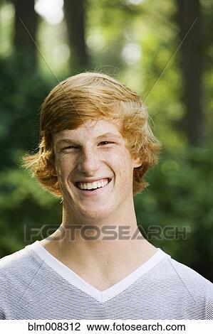 Grinning red haired teenage boy View Large Photo Image Stock Image - Grinning red haired teenage boy. Fotosearch