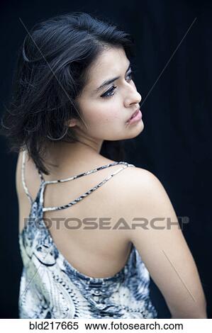 High angle view of serious mixed race woman View Large Photo Image Stock Photography - High angle view of serious mixed race woman. Fotosearch