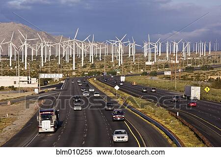 Highway past wind farm View Large Photo Image Stock Photography - Highway past wind farm. Fotosearch