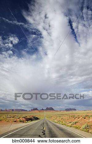Highway towards Monument Valley View Large Photo Image Picture - Highway towards Monument Valley. Fotosearch