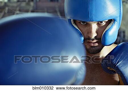 Hispanic boxer training in gym View Large Photo Image Stock Image - Hispanic boxer training in gym. Fotosearch