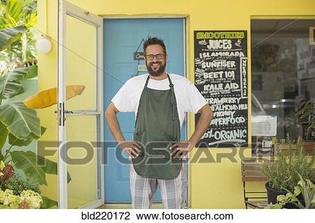 Hispanic entrepreneur smiling in cafe View Large Photo Image Stock Image - Hispanic entrepreneur smiling in cafe. Fotosearch