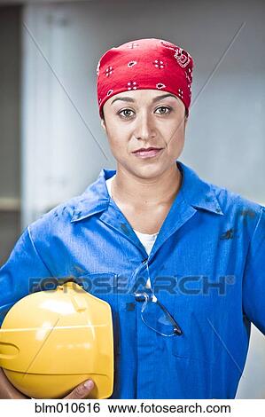 Stock Photograph - Hispanic female construction worker. Fotosearch