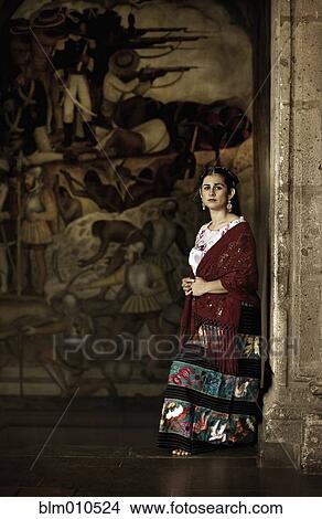 Picture - Hispanic woman in traditional clothing. Fotosearch