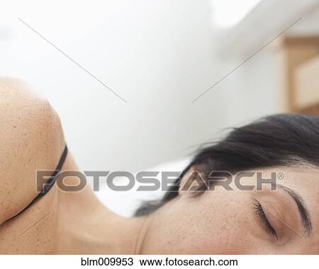 Hispanic woman sleeping in bed View Large Photo Image Stock Image - Hispanic woman sleeping in bed. Fotosearch