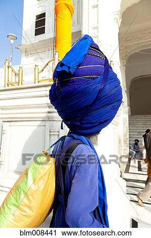 Stock Image - Indian man wearing large turban. Fotosearch