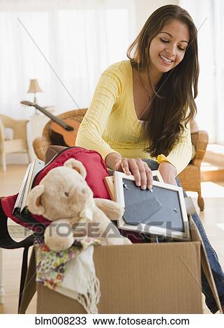 Indian student packing box preparing for college View Large Photo Image Stock Image - Indian student packing box preparing for college. Fotosearch