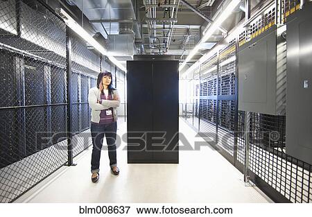 Japanese businesswoman working in office technology room View Large Photo Image Stock Photo - Japanese businesswoman working in office technology room. Fotosearch