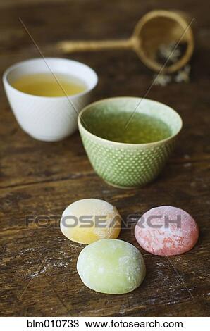 Jasmine tea and fruit rice cakes View Large Photo Image Stock Image - Jasmine tea and fruit rice cakes. Fotosearch