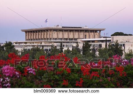 Stock Photo - Knesset and blooming flowers. Fotosearch