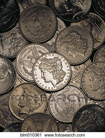 Stock Image - Large group of silver dollars. Fotosearch
