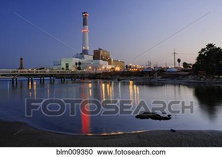 Lighted tower at power station View Large Photo Image Stock Image - Lighted tower at power station. Fotosearch