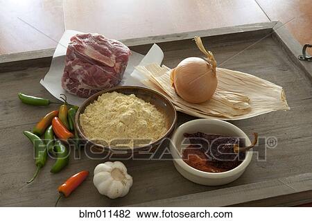 Stock Image - Meat, rice, onion and peppers on tray. Fotosearch