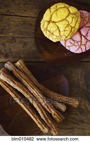 Stock Image - Mexican pastries and churros. Fotosearch