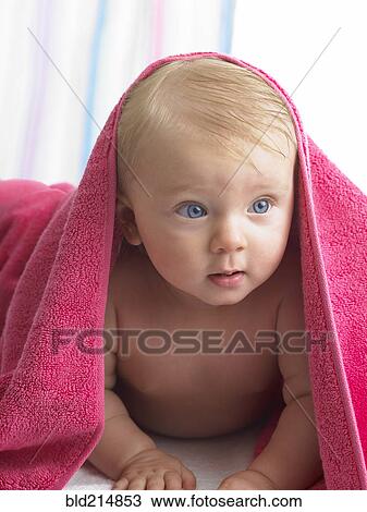 Mixed race baby girl laying under towel View Large Photo Image Stock Image - Mixed race baby girl laying under towel. Fotosearch
