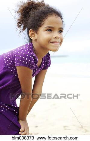 Mixed race girl on beach View Large Photo Image Stock Image - Mixed race girl on beach. Fotosearch