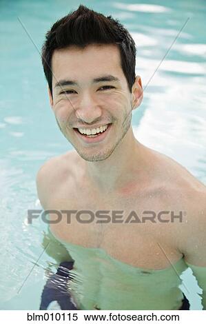 Mixed race man in swimming pool View Large Photo Image Stock Photography - Mixed race man in swimming pool. Fotosearch