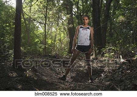 Mixed race runner in forest View Large Photo Image Stock Photography - Mixed race runner in forest. Fotosearch