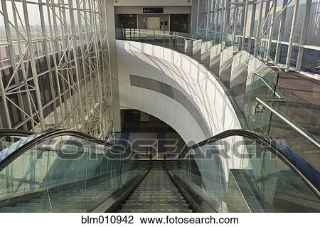 Stock Image - Modern walkway and escalator. Fotosearch