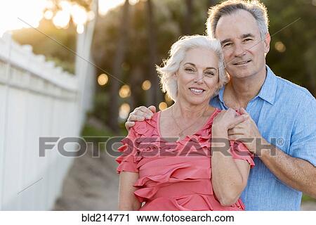 Older Caucasian couple hugging on beach View Large Photo Image Stock Image - Older Caucasian couple hugging on beach. Fotosearch