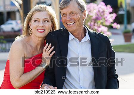 Older Caucasian couple hugging outdoors View Large Photo Image Stock Image - Older Caucasian couple hugging outdoors. Fotosearch
