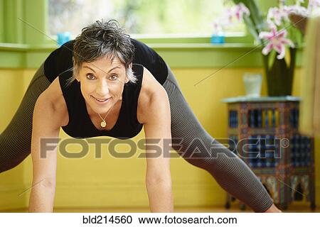 Older Caucasian woman practicing yoga View Large Photo Image Stock Image - Older Caucasian woman practicing yoga. Fotosearch