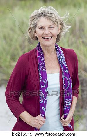 Stock Photography - Older Caucasian woman smiling outdoors. Fotosearch