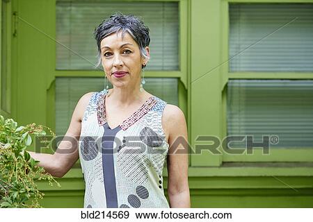 Stock Photo - Older Caucasian woman standing outdoors. Fotosearch