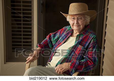 Older Caucasian woman wearing cowboy hat View Large Photo Image Stock Image - Older Caucasian woman wearing cowboy hat. Fotosearch