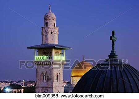 Stock Photo - Ornate minaret tower at night. Fotosearch