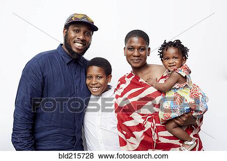 Stock Photo - Parents and children hugging. Fotosearch
