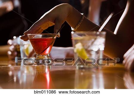 People drinking in nightclub View Large Photo Image Stock Photograph - People drinking in nightclub. Fotosearch
