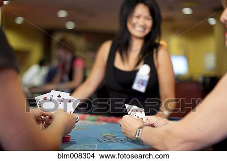 People playing poker in casino View Large Photo Image Picture - People playing poker in casino. Fotosearch