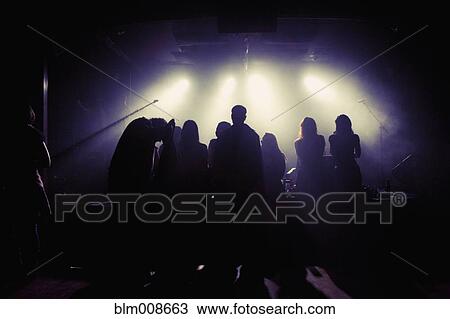 People socializing in nightclub View Large Photo Image Stock Image - People socializing in nightclub. Fotosearch