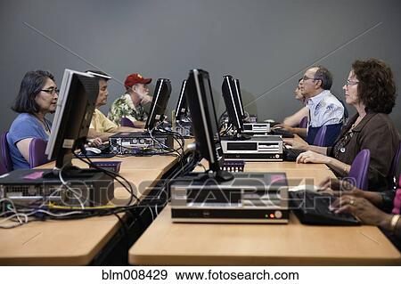 Stock Photo - People using computers in computer lab. Fotosearch