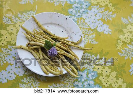Plate of fresh green beans and flower View Large Photo Image Picture - Plate of fresh green beans and flower. Fotosearch