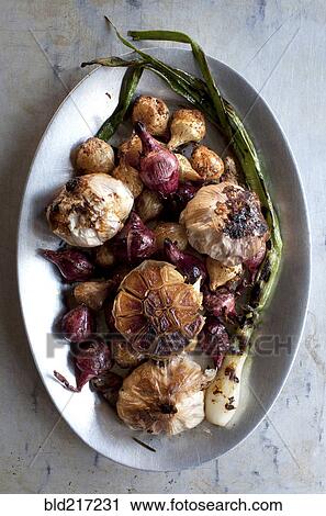 Plate of roast vegetables and garlic View Large Photo Image Stock Image - Plate of roast vegetables and garlic. Fotosearch